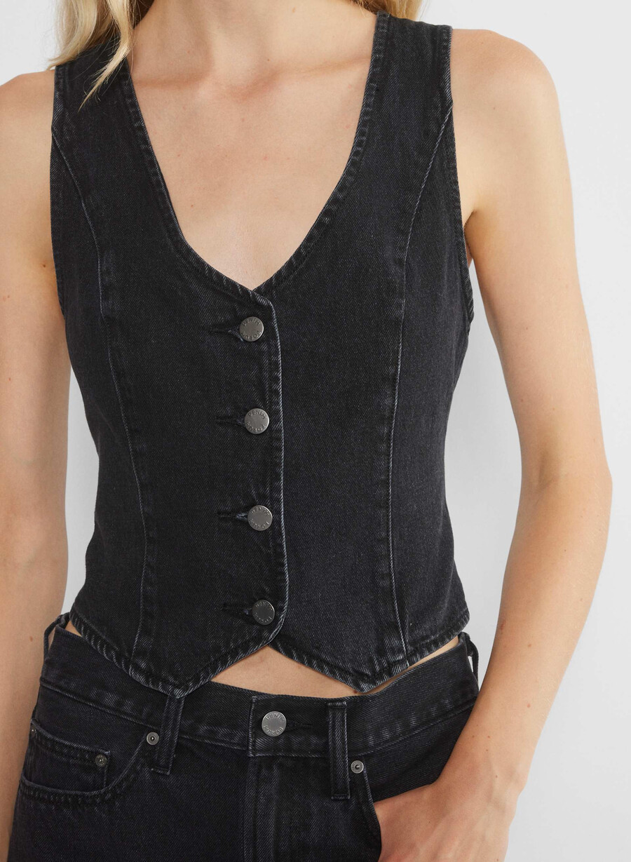 denim forum 90-talets mia jeansväst svart eyeliner