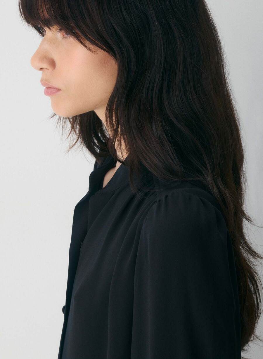 delphine blus svart