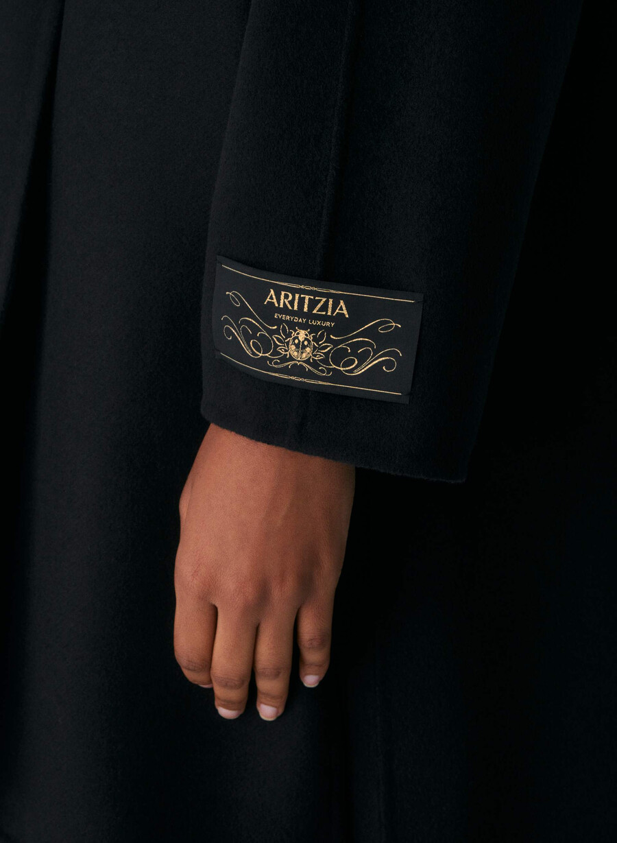 the embrace dubbelsidig kappa - luxe rewool svart