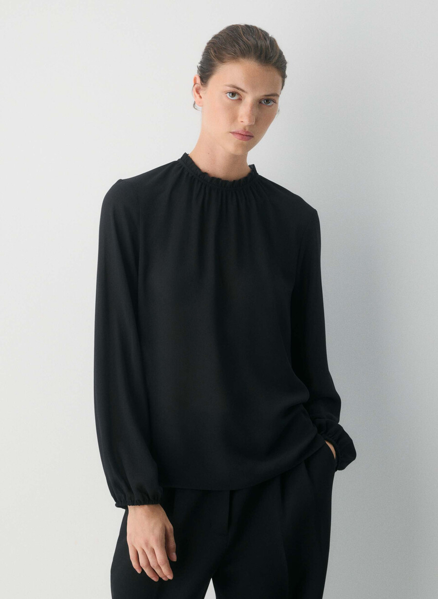 trinity-blus svart