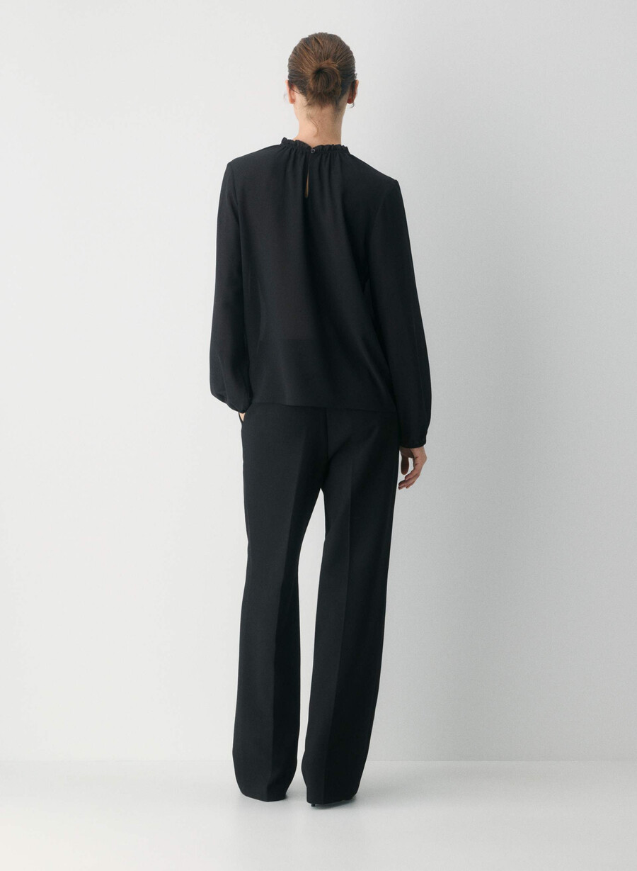 trinity-blus svart
