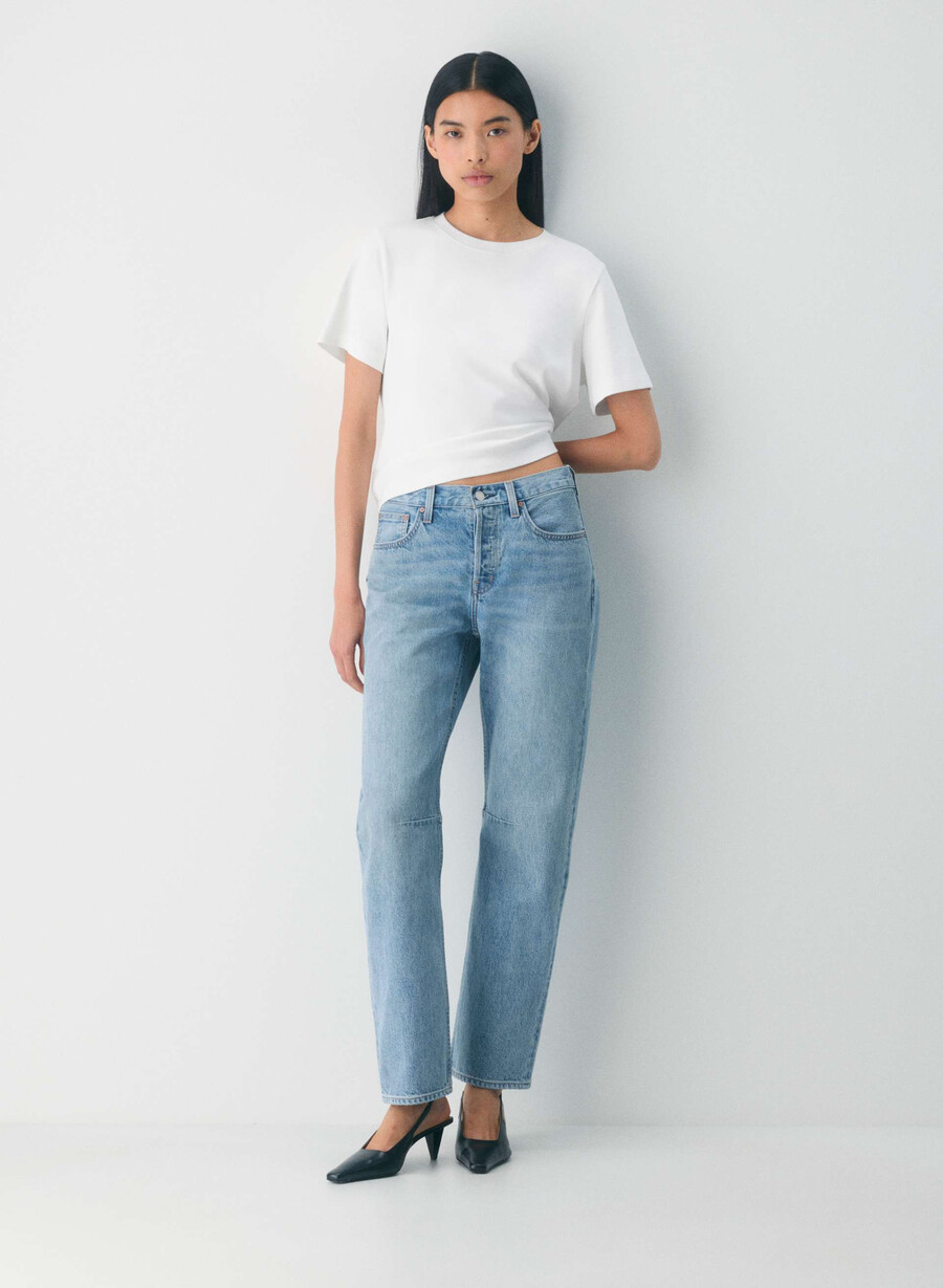 denim forum 90-talets mellanhöga lösa avsmalnande jeans 7 år bleu taboo