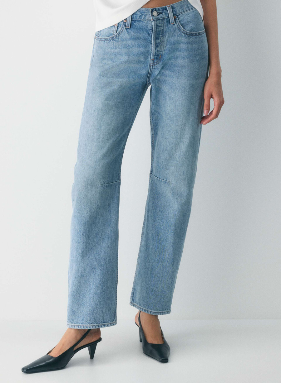 denim forum 90-talets mellanhöga lösa avsmalnande jeans 7 år bleu taboo