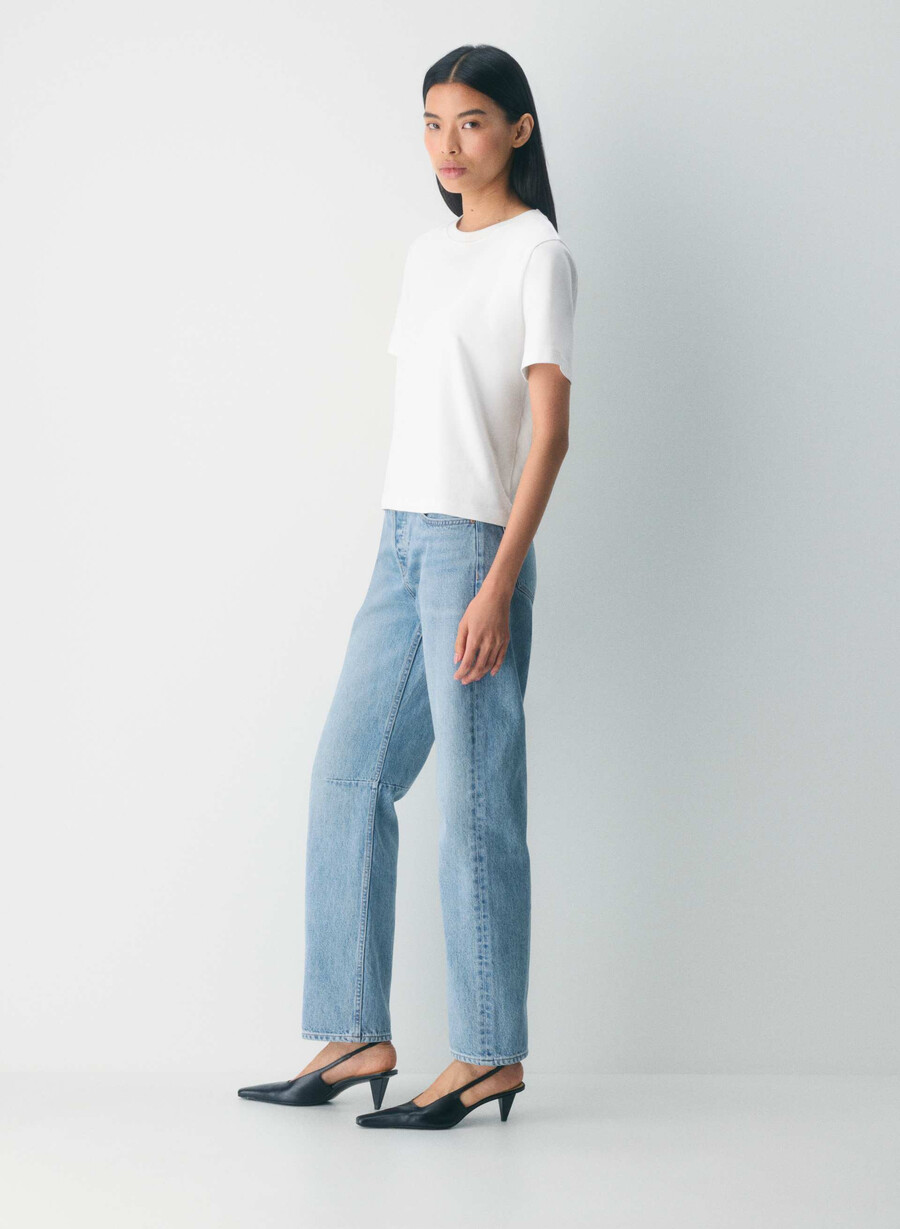 denim forum 90-talets mellanhöga lösa avsmalnande jeans 7 år bleu taboo