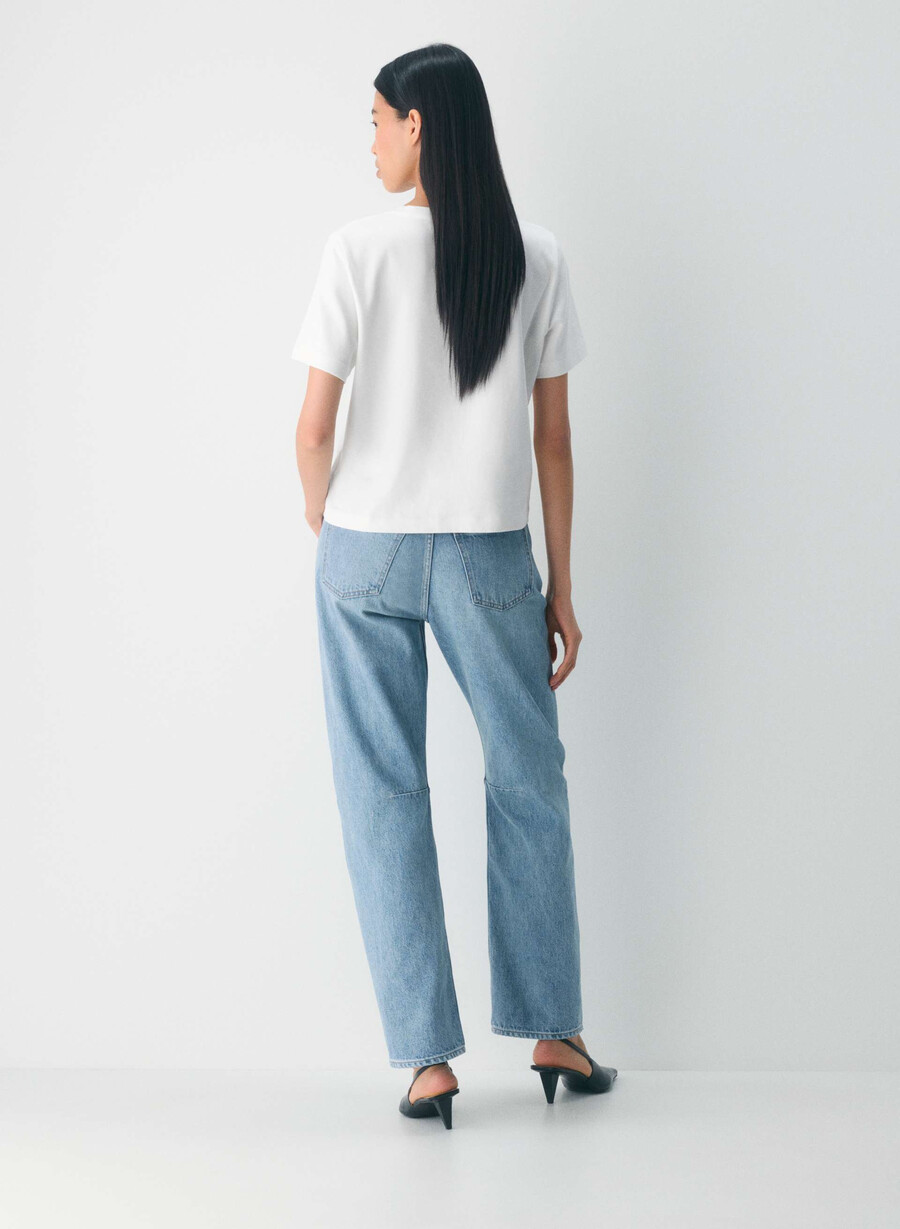 denim forum 90-talets mellanhöga lösa avsmalnande jeans 7 år bleu taboo