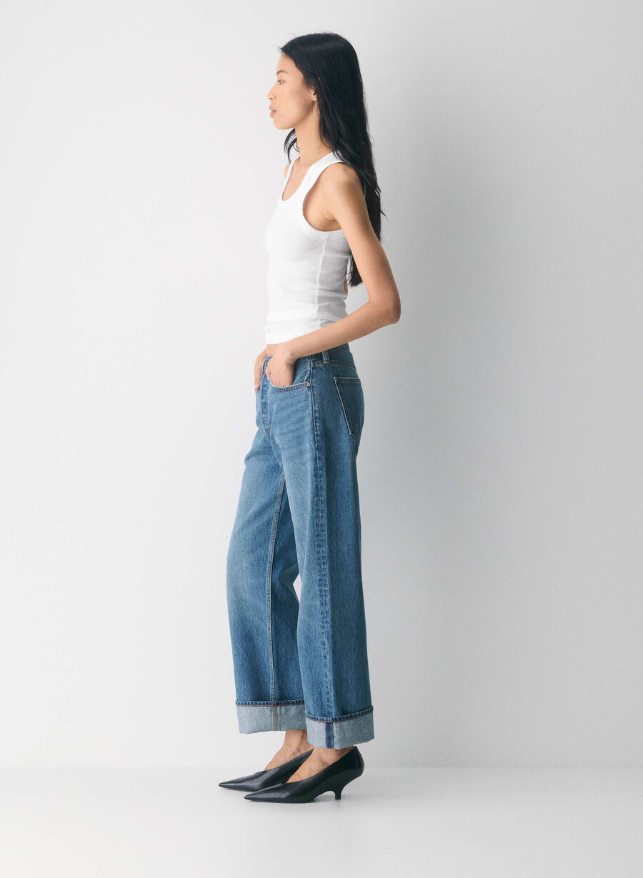 denim forum 90-tals vintagejeans med låg midja och manschett 5 år kiss n tell svart