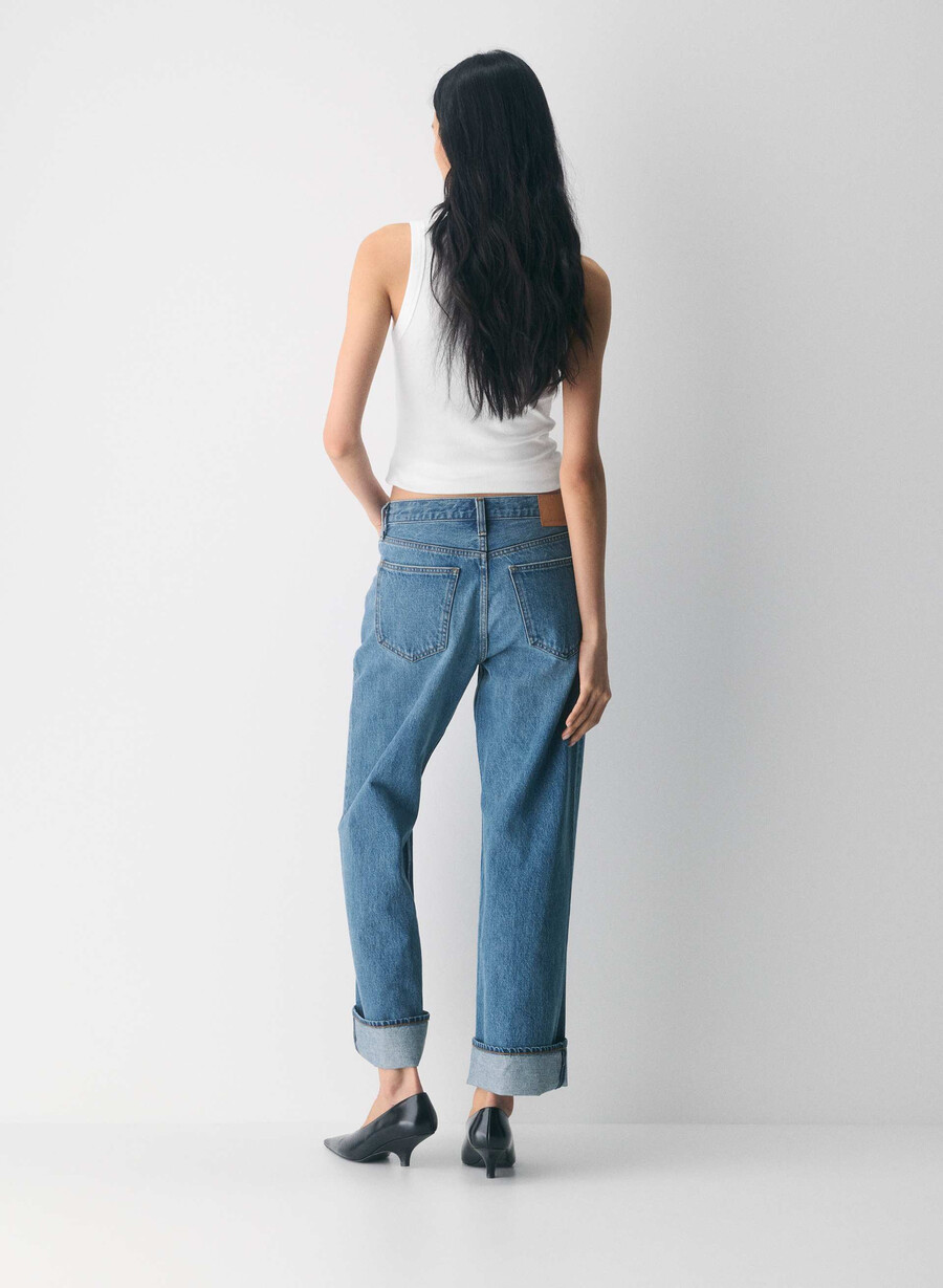 denim forum 90-tals vintagejeans med låg midja och manschett 5 år kiss n tell svart