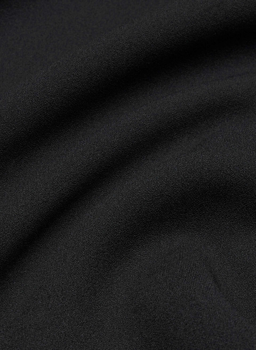 figureknit blickfångande miniklänning svart
