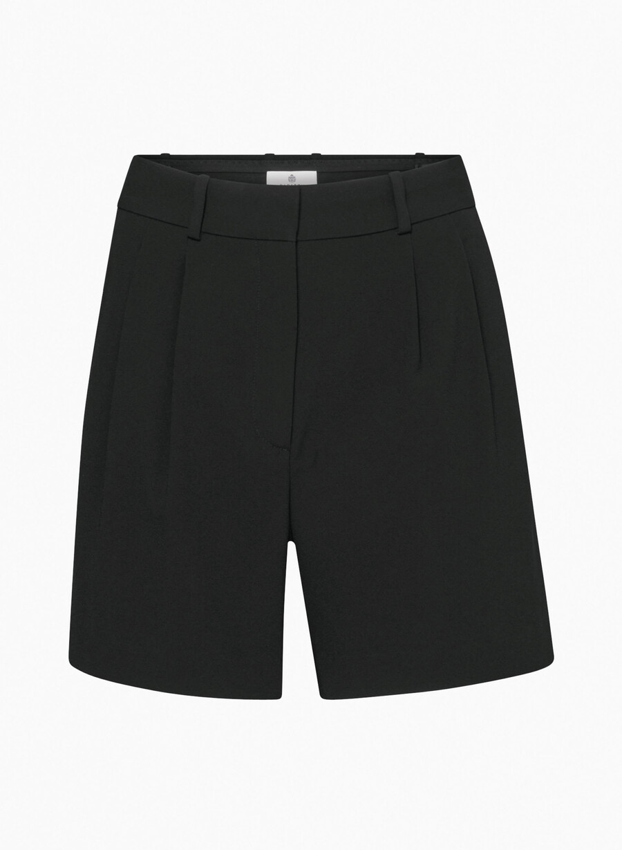 plisserade shorts till mitten av låret svart