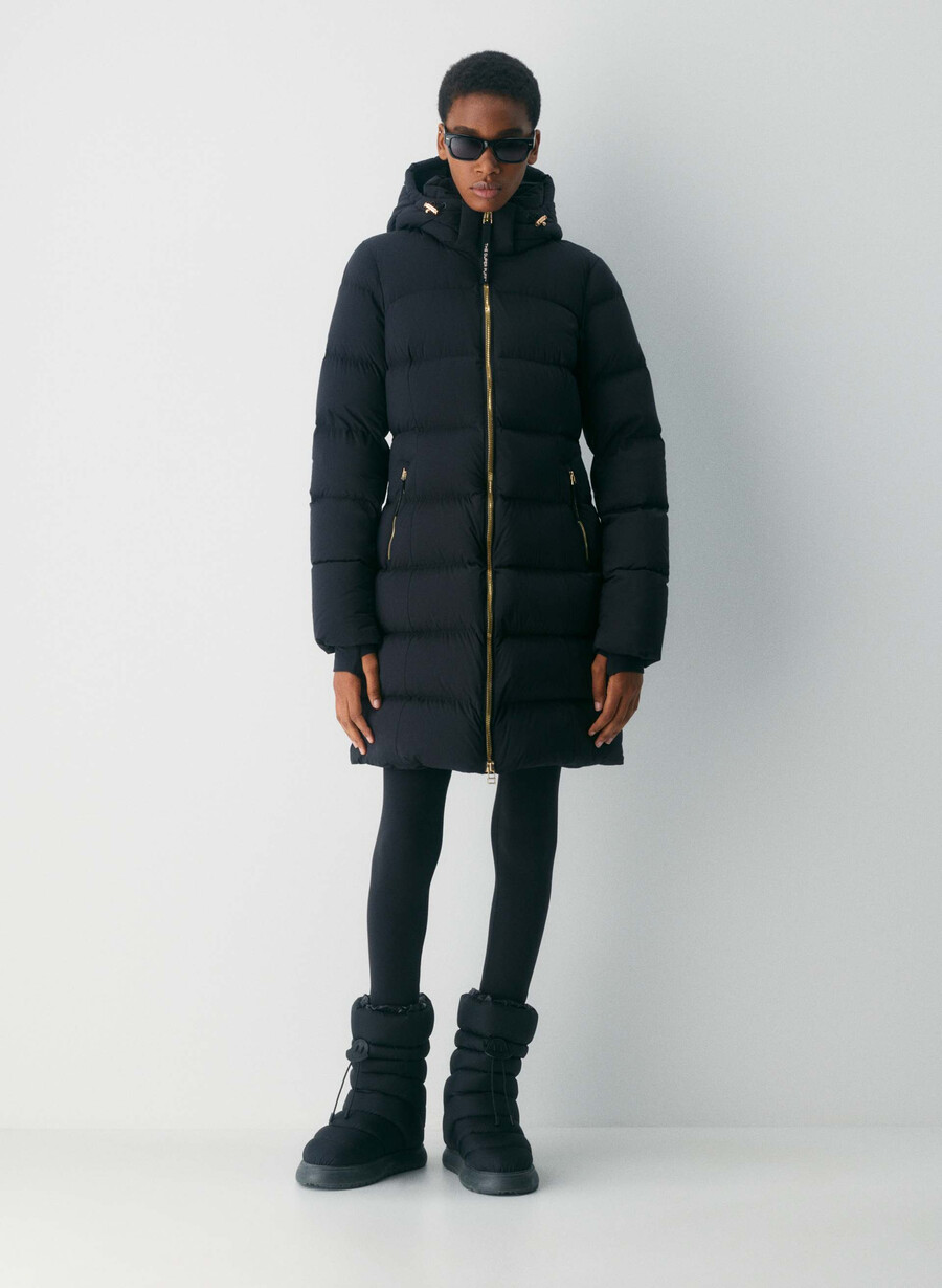 supersnug puff mid - climatte svartglansande guld