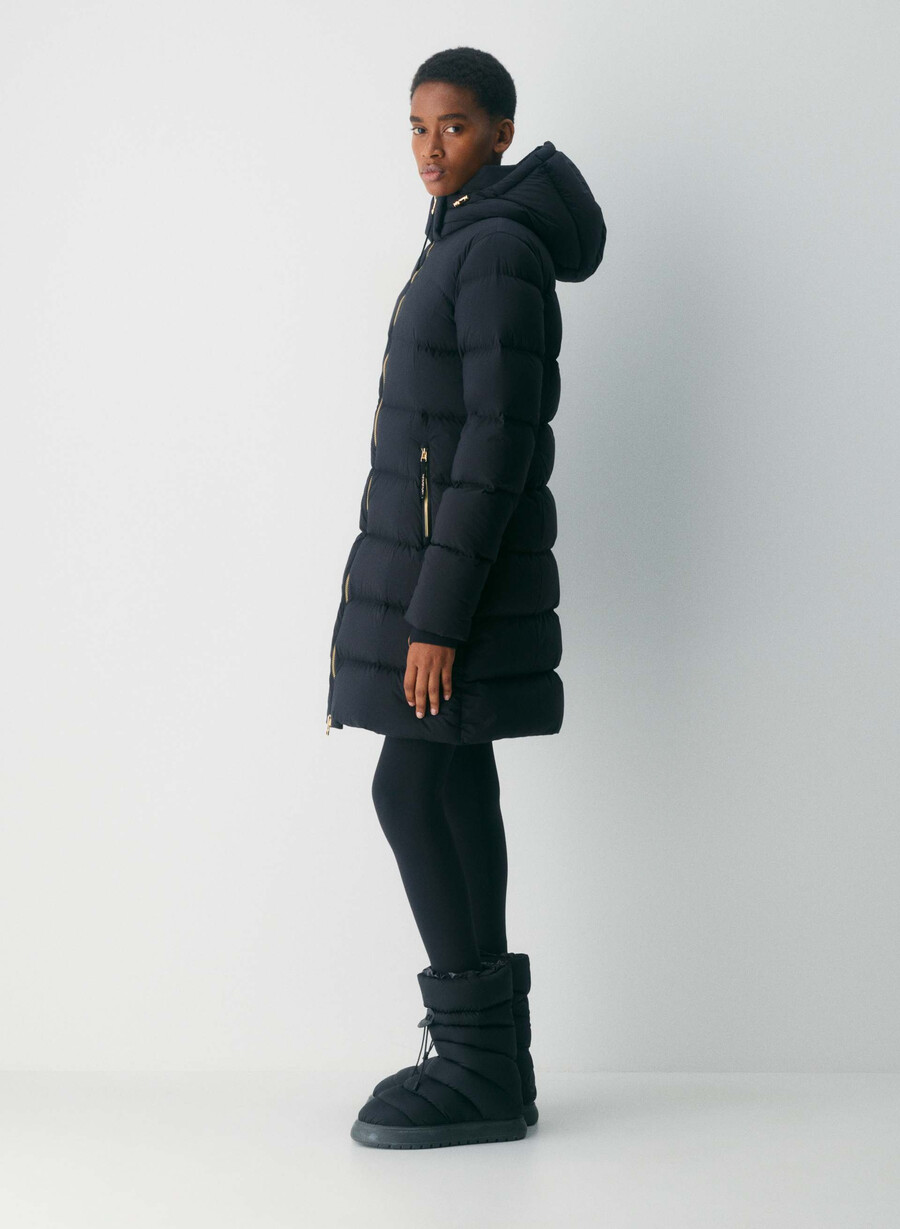supersnug puff mid - climatte svartglansande guld