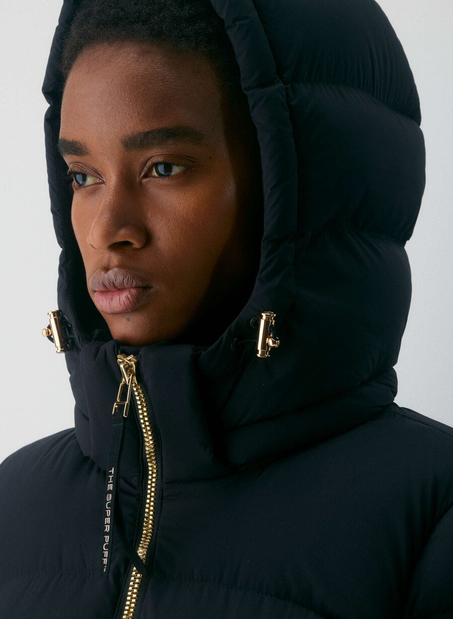 supersnug puff mid - climatte svartglansande guld