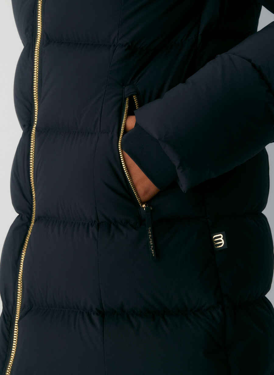 supersnug puff mid - climatte svartglansande guld